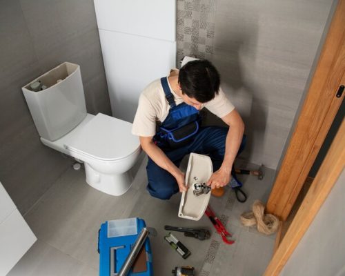 male-plumber-working-fix-problems-client-s-house_23-2150990706